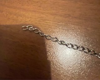 Braccialetto metallo con pendenti stelle