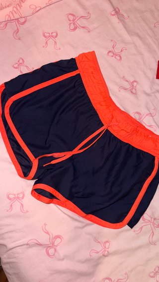 Bañador deportivo azul y naranja
