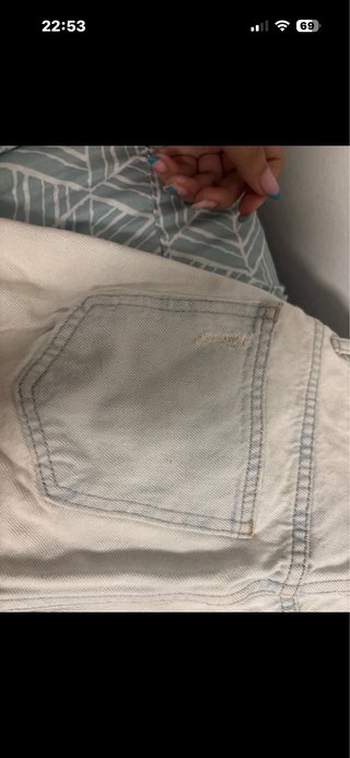 Pantalón vaquero desgastado