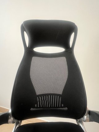 Silla giratoria de escritorio. Con respaldo alto.