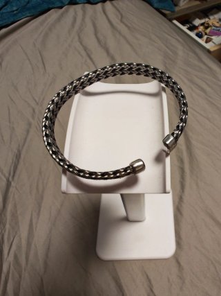Pulsera trenzada plata y negro