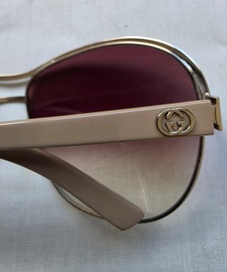 Gafas de sol Gucci Beige y Doradas