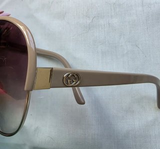 Gafas de sol Gucci Beige y Doradas