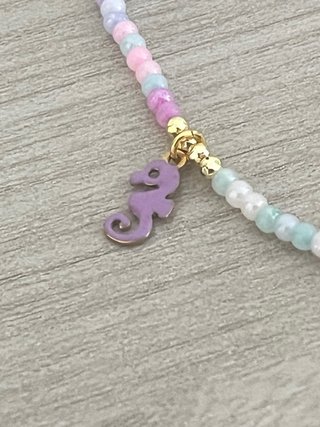 Collana perline colorate con ciondoli