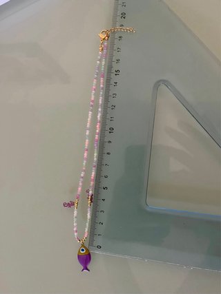 Collana perline colorate con ciondoli