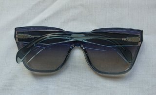 Gafas de sol Prada pantalla celeste y plateado