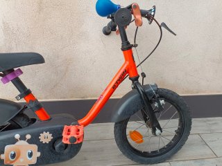 Bicicleta infantil Btwin con asiento y ruedines