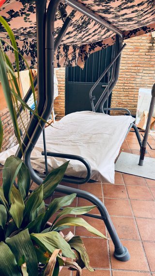 Balancín de jardín convertible en cama