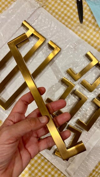 Tiradores dorados