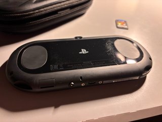 Sony PS Vita Negra + Funda + Juego