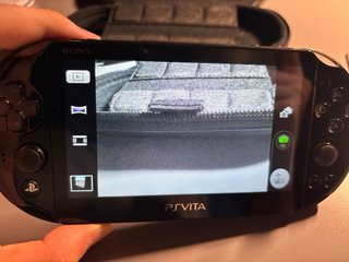 Sony PS Vita Negra + Funda + Juego