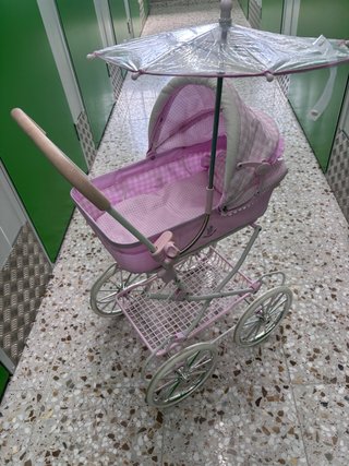 Cochecito de muñecas rosa Decuevas