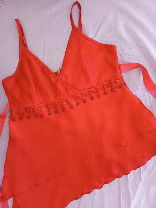 Top Camomilla rosso con paillettes