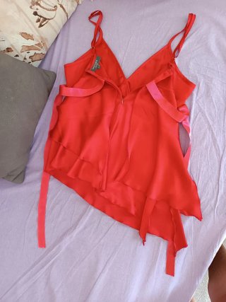 Top Camomilla rosso con paillettes