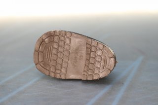 39. Nancy de Famosa mocasín marrón pie izquierdo.