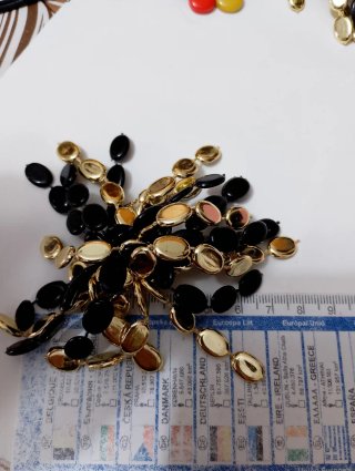 Orecchini vintage cascata neri e oro
