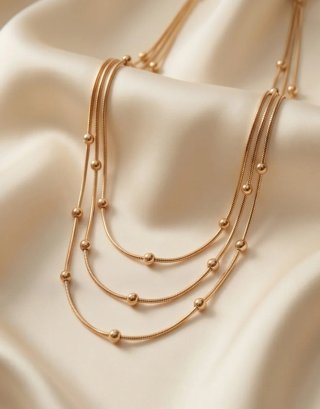 Gargantilla triple chapado oro 18k bolitas