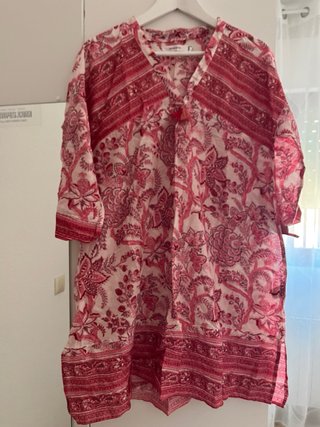 Camisa playera ligera rosa y blanca