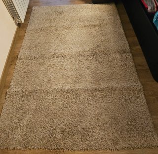 Alfombra beige y marrón de poliéster