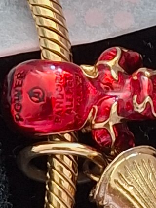 Pulsera Pandora Oro con Charms