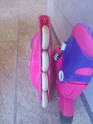 Patines Oxelo rosas talla ajustable + Casco