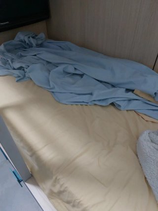 Juego de sábanas beige y azul