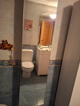 Armario baño con puerta de espejo