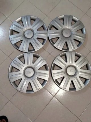 Tapacubos Ford 14 Originales. Acepto cambio por 15