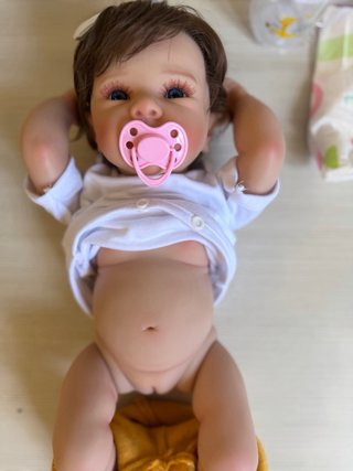 Bambola reborn con accessori
