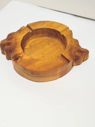 Posacenere rotondo in legno con teste