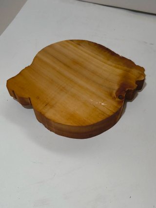 Posacenere rotondo in legno con teste