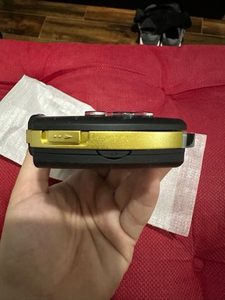 PSP 3000 personalizada negra y dorada
