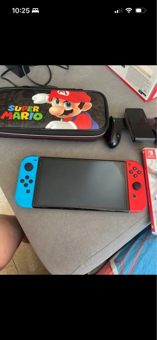 Nintendo Switch OLED + Estuche Mario + FIFA 23