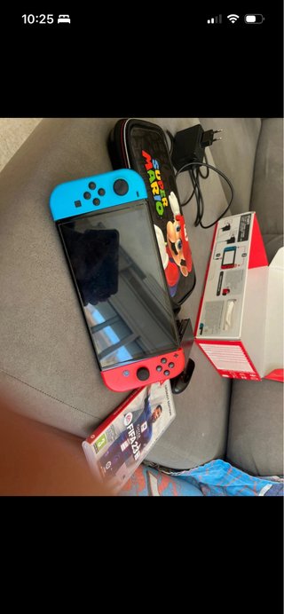 Nintendo Switch OLED + Estuche Mario + FIFA 23
