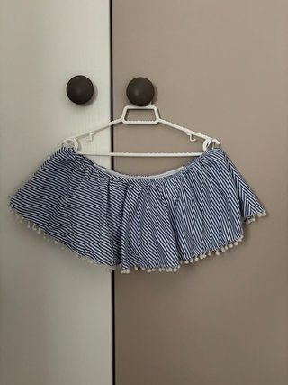 Top rayas blanco y azul con pompones