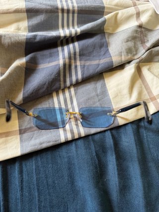 Occhiali da sole senza montatura blu e oro
