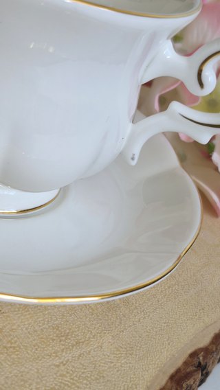 Taza y platillo porcelana inglesa dorada