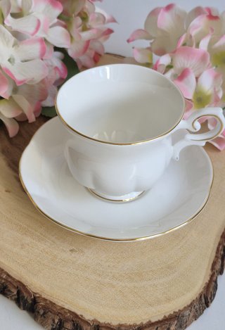 Taza y platillo porcelana inglesa dorada