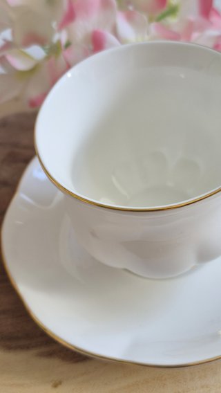 Taza y platillo porcelana inglesa dorada