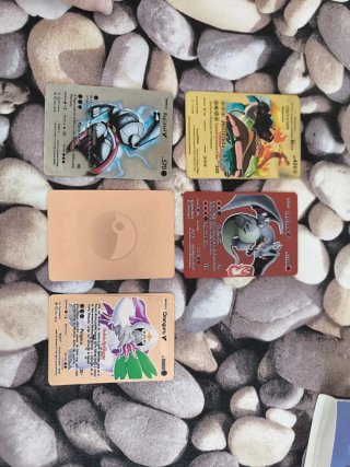 Álbum y cartas Pokémon
