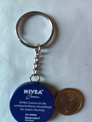 Llavero Mapfre con casa, coche y corazón