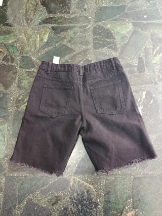 Pantalones vaqueros negros rotos