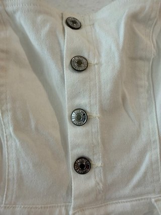 Mono vaquero blanco