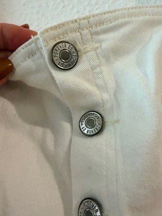 Mono vaquero blanco