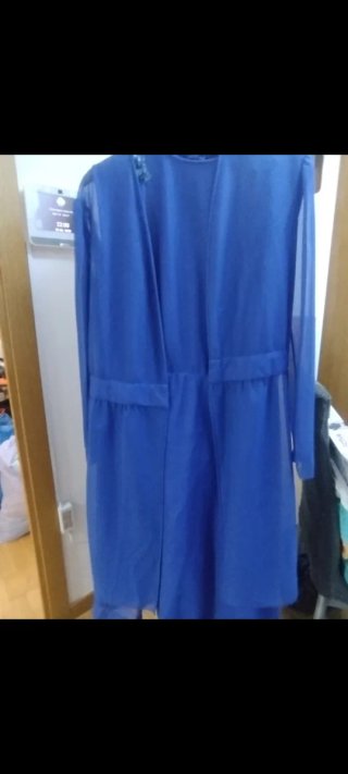 Varias piezas de ropa de señora talla grande