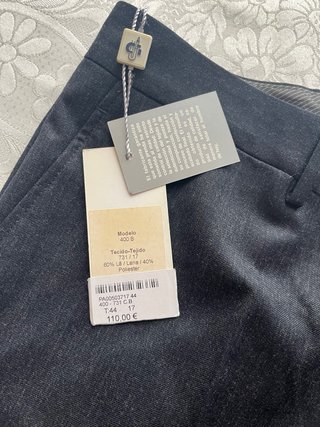 Pantalones de sastrería fin de Stock