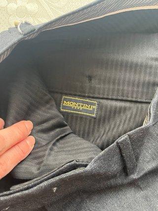 Pantalones de sastrería fin de Stock