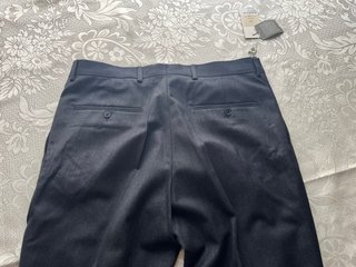 Pantalones de sastrería fin de Stock