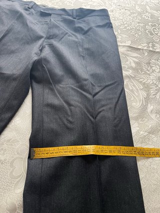 Pantalones de sastrería fin de Stock