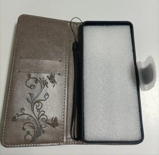 Custodia per telefono con ramoscello e farfalla